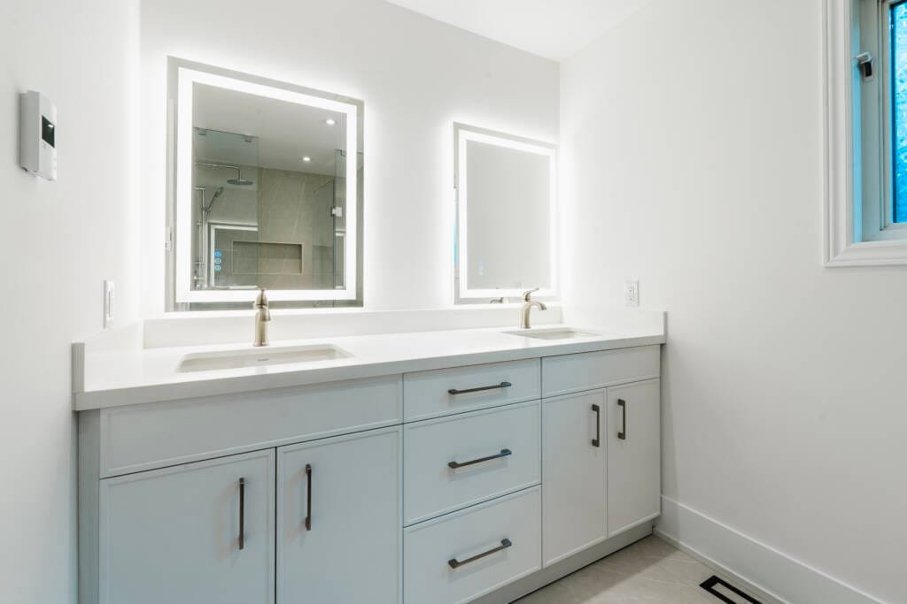 Spa-like bathroom renovation featuring walk-in shower and heated floors Toronto