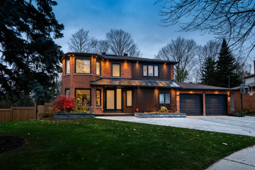 Toronto backyard landscaping renovation with outdoor kitchen and entertaining area